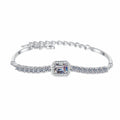 Emerald and Radiant Moissanite Tennis Bracelet with CZ in Rhodium-Plated S925 sterling silver styled product scene showing stone sparkle and chain detail