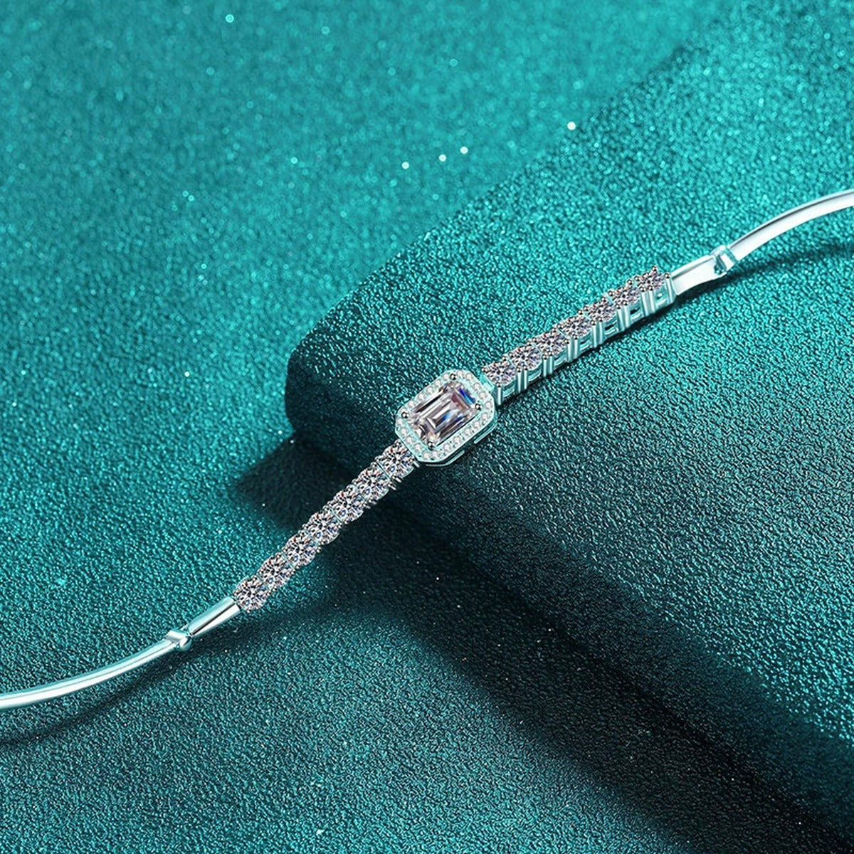 Emerald and Radiant Moissanite Tennis Bracelet with CZ in Rhodium-Plated S925 sterling silver angled product display showing bracelet silhouette