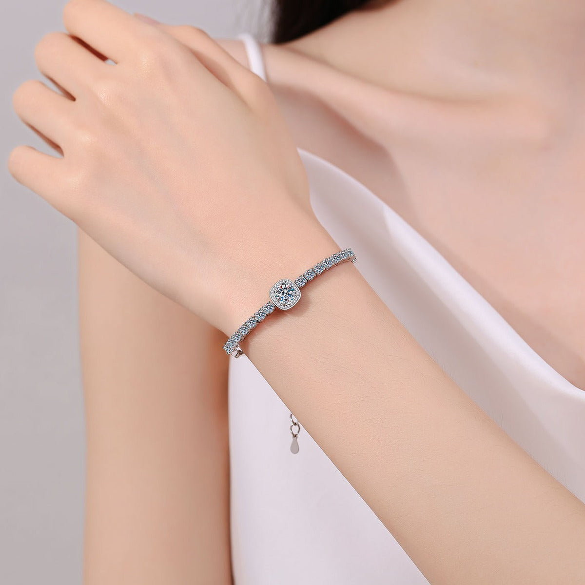 Round Moissanite Tennis Bracelet with CZ in Rhodium-Plated S925 sterling silver worn on wrist model view showing scale and adjustable fit