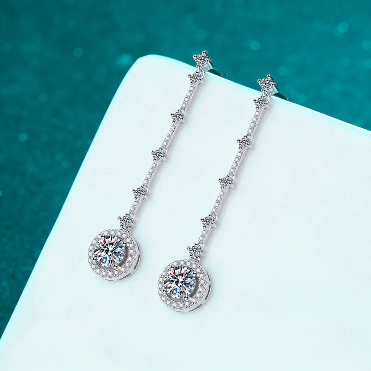 Round Moissanite Stud Dangle Earrings with CZ in Rhodium-Plated S925 sterling silver product scene view showing front sparkle