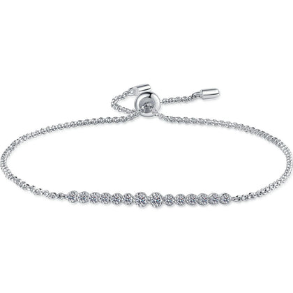 Round Moissanite Tennis Bracelet in Rhodium and Champion Gold-Plated S925 sterling silver white background product photo showing bracelet shape and moissanite setting