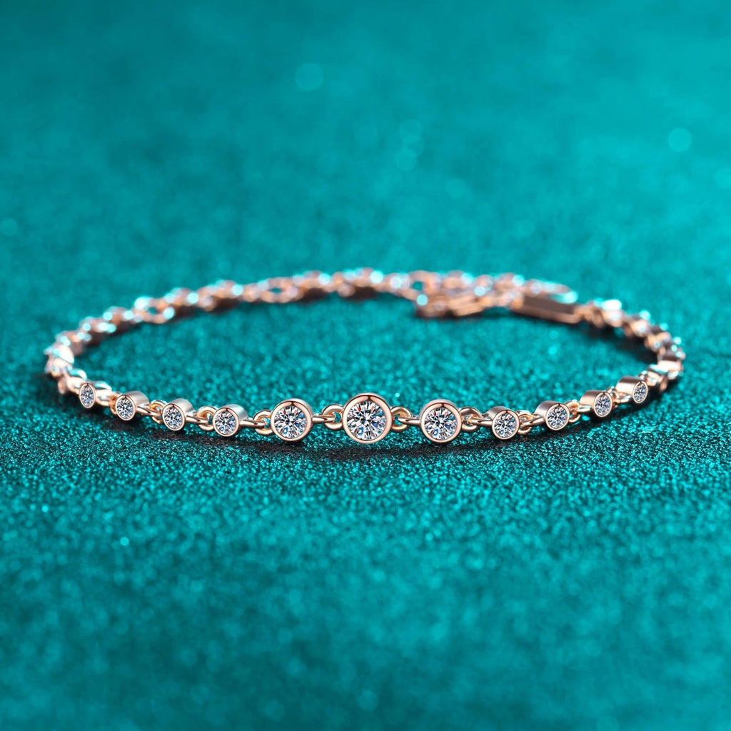 Beaded Round Moissanite Tennis Bracelet in Rhodium and Champion Gold-Plated S925 sterling silver angled product display showing bracelet silhouette