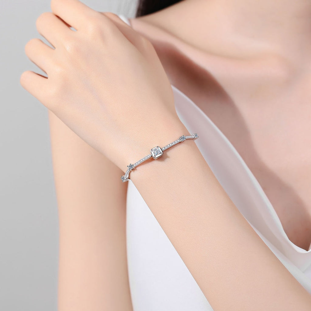 Princess and Round Moissanite Tennis Bracelet in Rhodium-Plated S925 sterling silver worn on wrist model view showing scale and adjustable fit