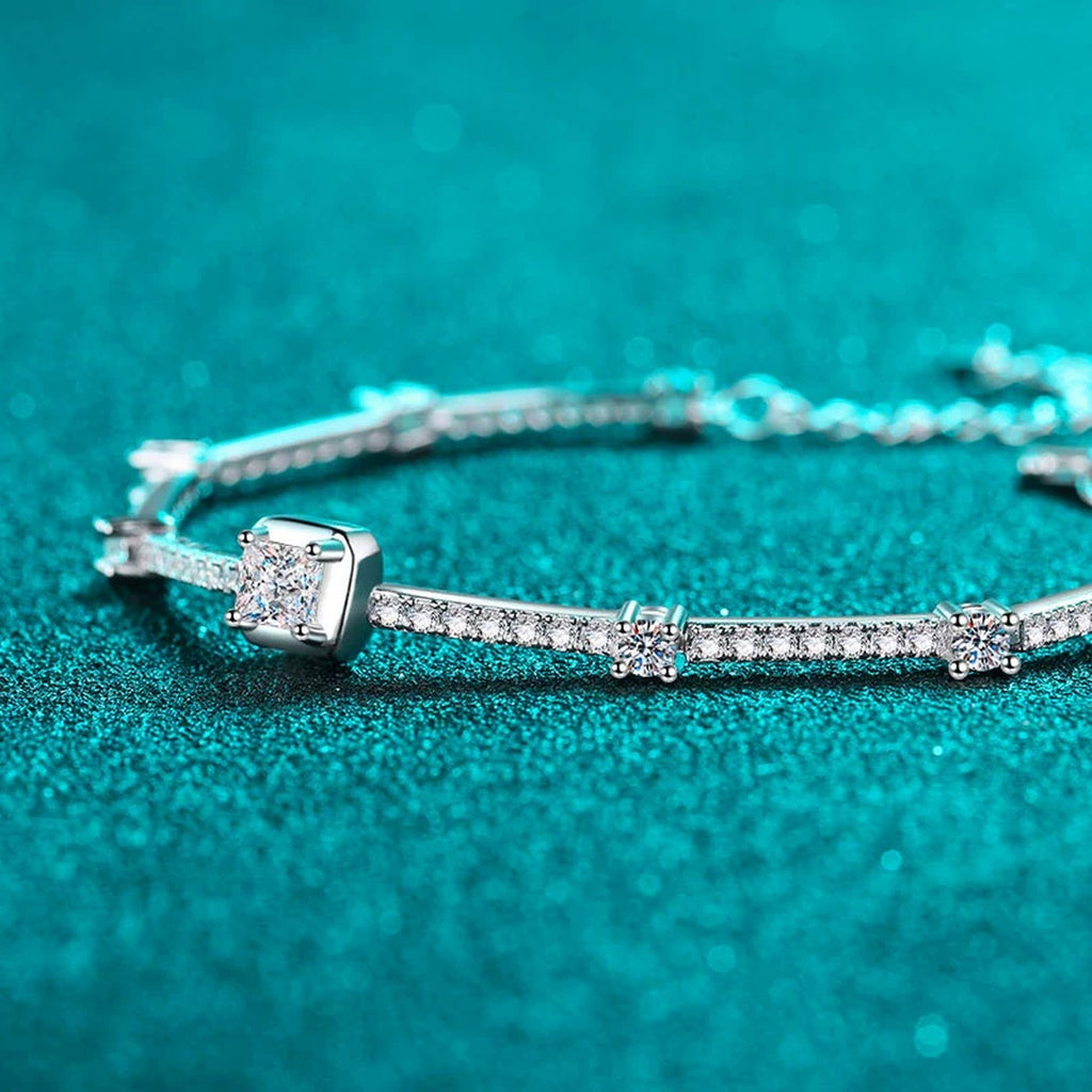 Princess and Round Moissanite Tennis Bracelet in Rhodium-Plated S925 sterling silver angled product display showing bracelet silhouette