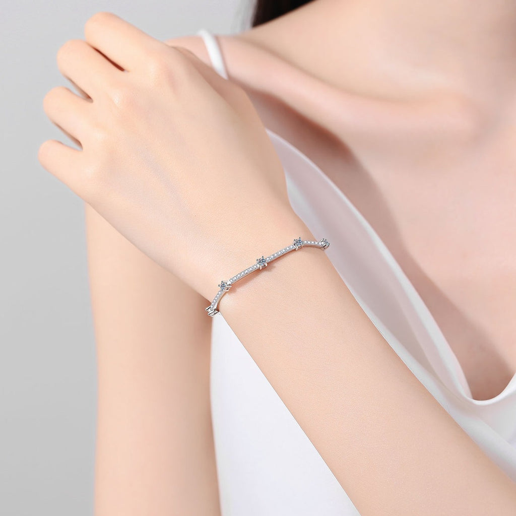 Slim Round Moissanite Adjustable Tennis Bracelet in Rhodium-Plated S925 sterling silver worn on wrist model view showing scale and adjustable fit