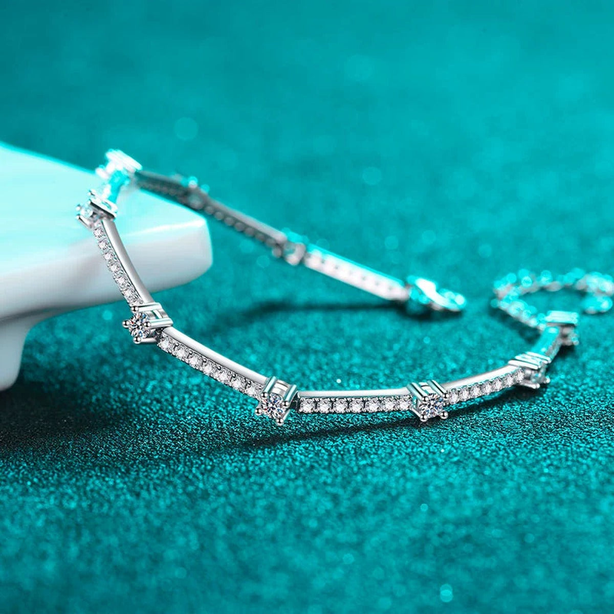 Slim Round Moissanite Adjustable Tennis Bracelet in Rhodium-Plated S925 sterling silver styled product scene showing stone sparkle and chain detail