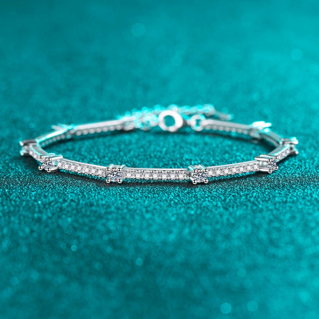 Slim Round Moissanite Adjustable Tennis Bracelet in Rhodium-Plated S925 sterling silver angled product display showing bracelet silhouette