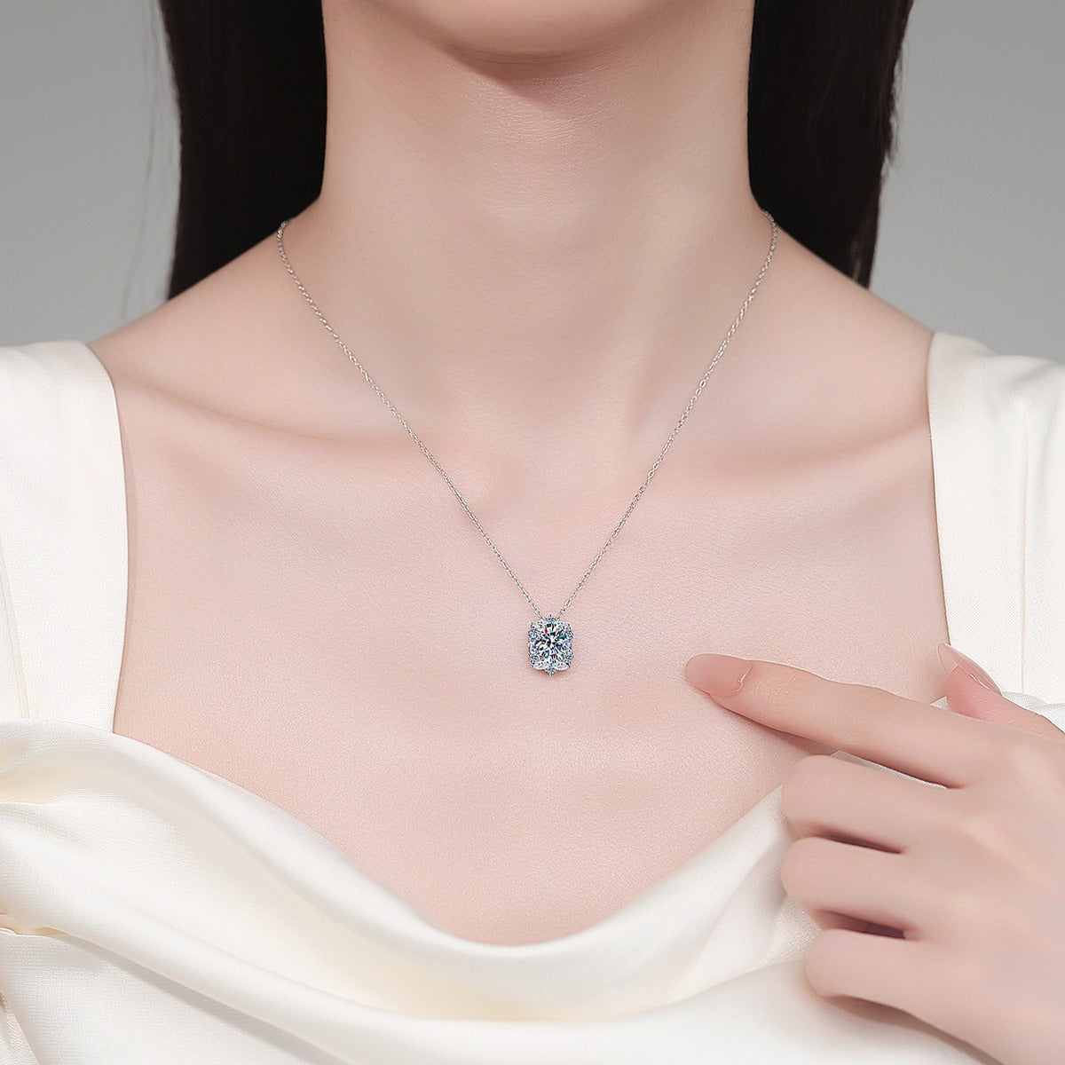 Vintage Oval Halo Moissanite Pendant Necklace with CZ in Rhodium-Plated S925 sterling silver neckline model view showing pendant scale and adjustable chain