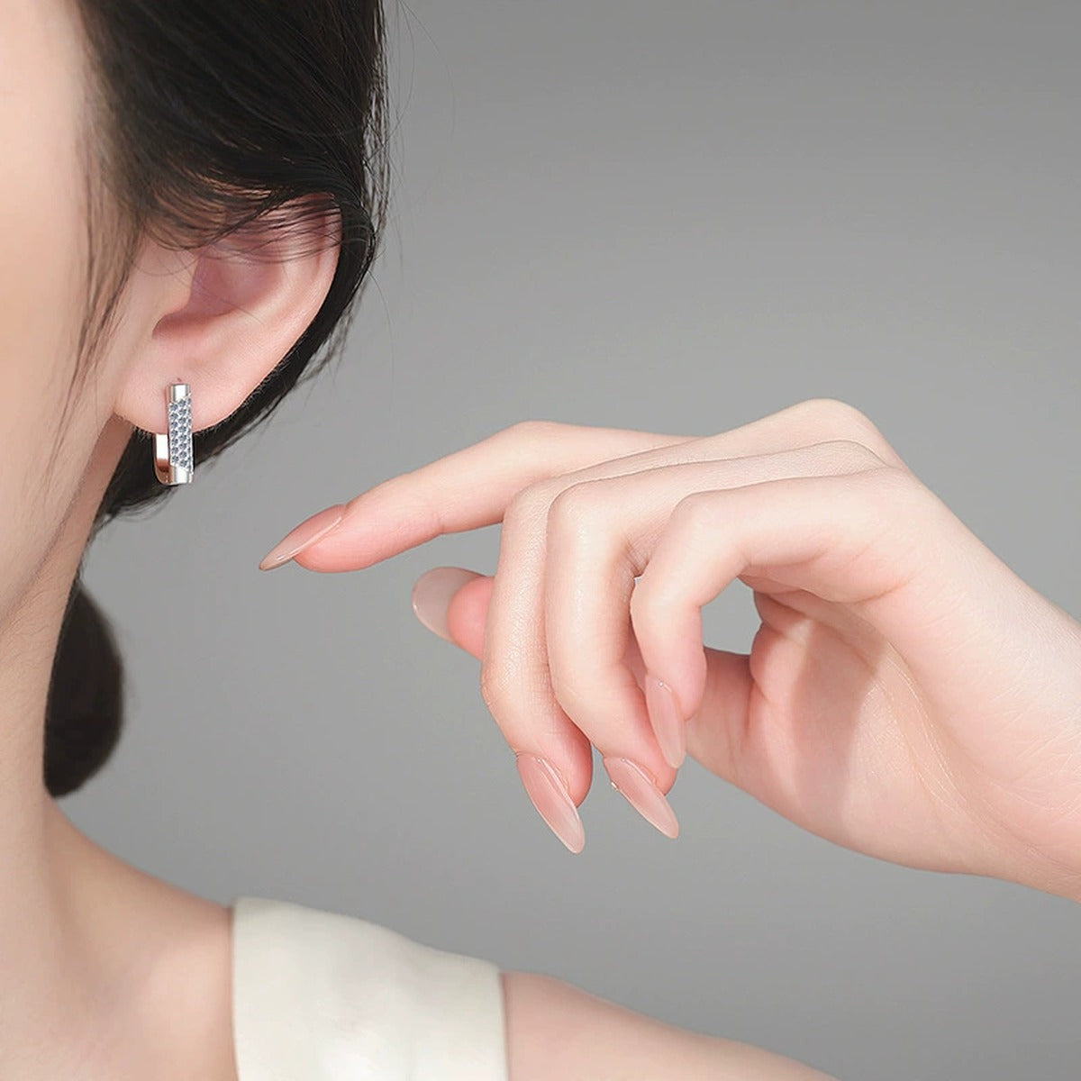 Rectangle Pave Moissanite Hoop Earrings in Rhodium-Plated S925 sterling silver worn on ear by model showing scale, placement, and hoop earrings styling