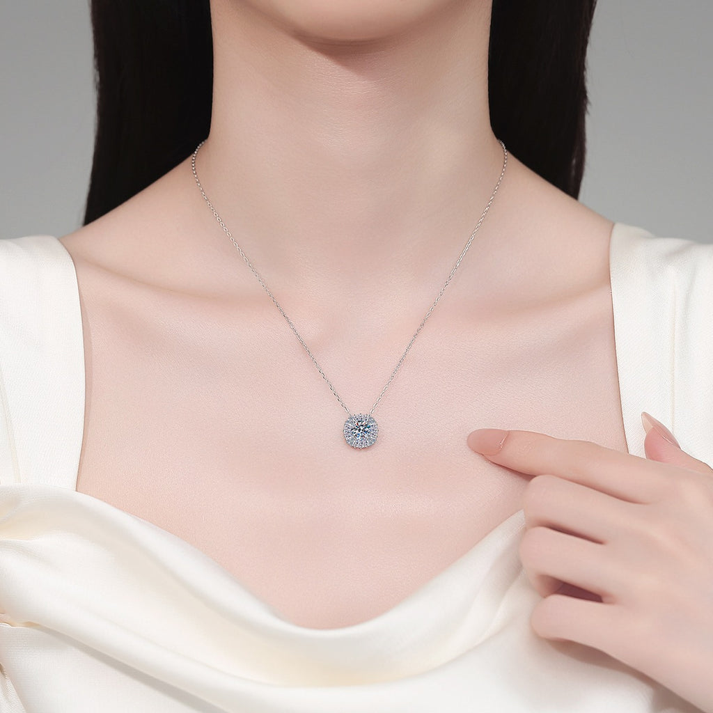 Round Halo Moissanite Pendant Necklace with CZ in Rhodium-Plated S925 sterling silver neckline model view showing pendant scale and adjustable chain