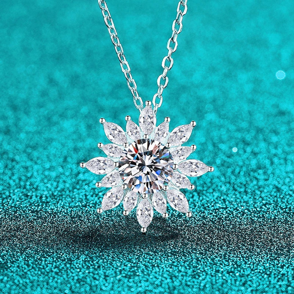 Sunburst Round Moissanite Pendant Necklace with CZ in Rhodium-Plated S925 sterling silver blue display scene showing chain and stone layout