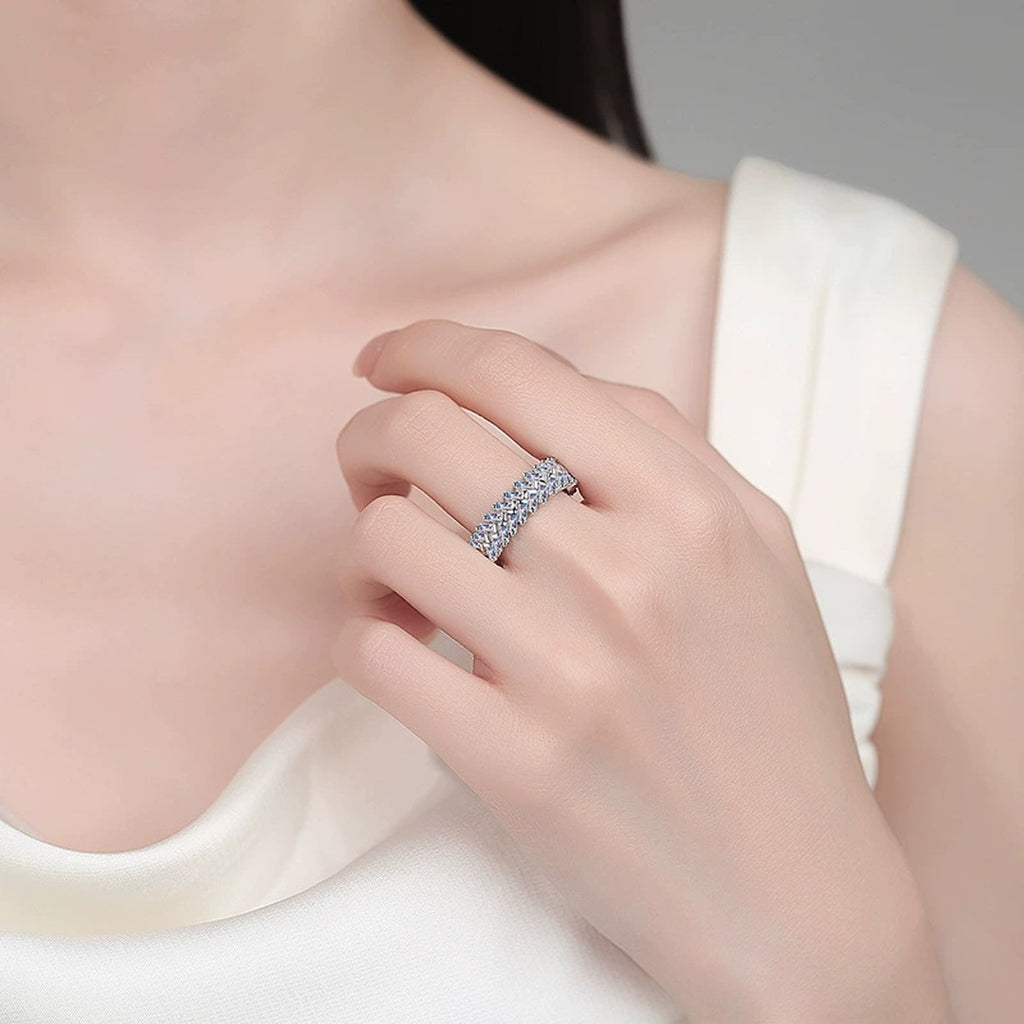 Emerald Cut Moissanite Eternity Band Ring worn on hand to show scale, band width, and ring profile