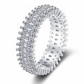 Round and Emerald Moissanite Eternity Band Ring in rhodium-plated S925 sterling silver on clean white background