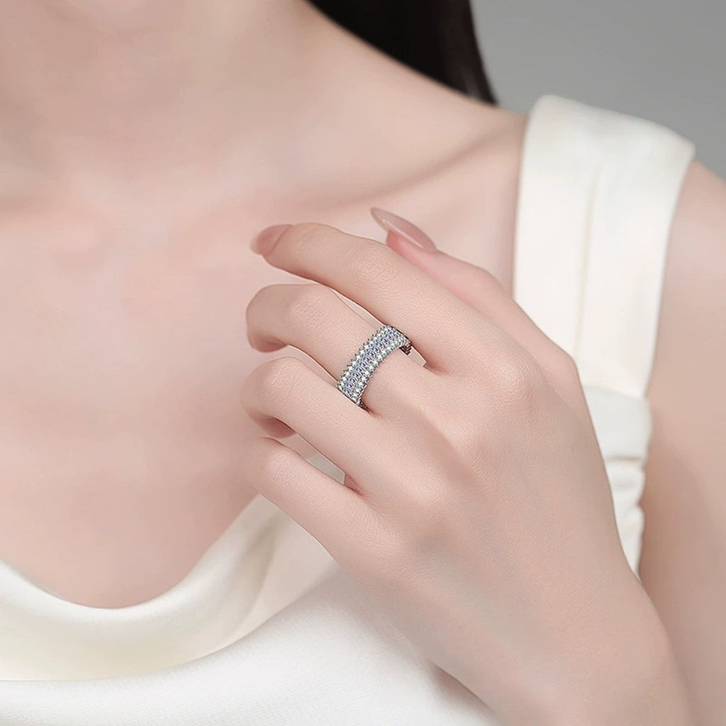 Round and Emerald Moissanite Eternity Band Ring worn on hand to show scale, band width, and ring profile