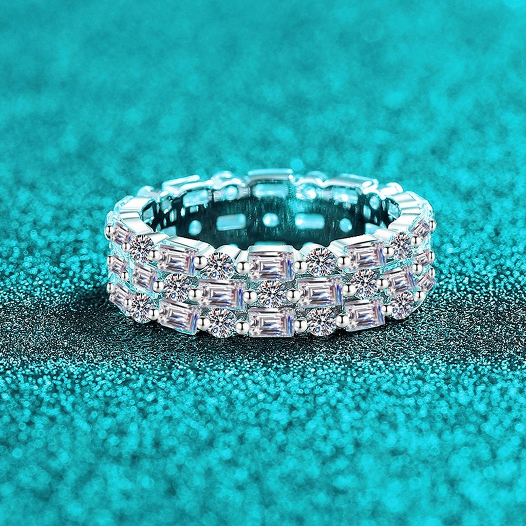 Emerald and Round Moissanite Eternity Band Ring product view showing moissanite setting and metal finish
