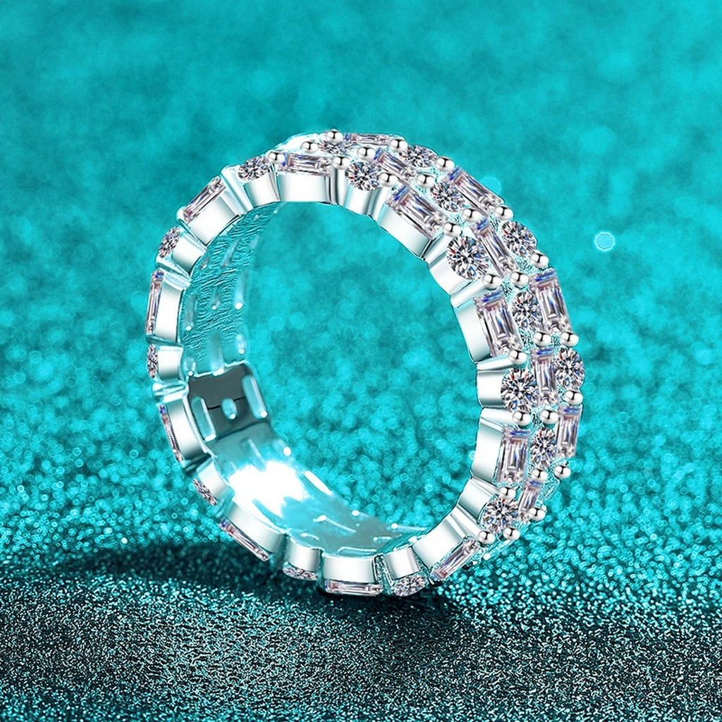 Emerald and Round Moissanite Eternity Band Ring product view showing moissanite setting and metal finish