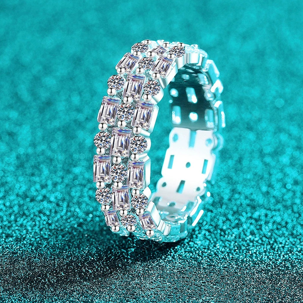 Emerald and Round Moissanite Eternity Band Ring product view showing moissanite setting and metal finish