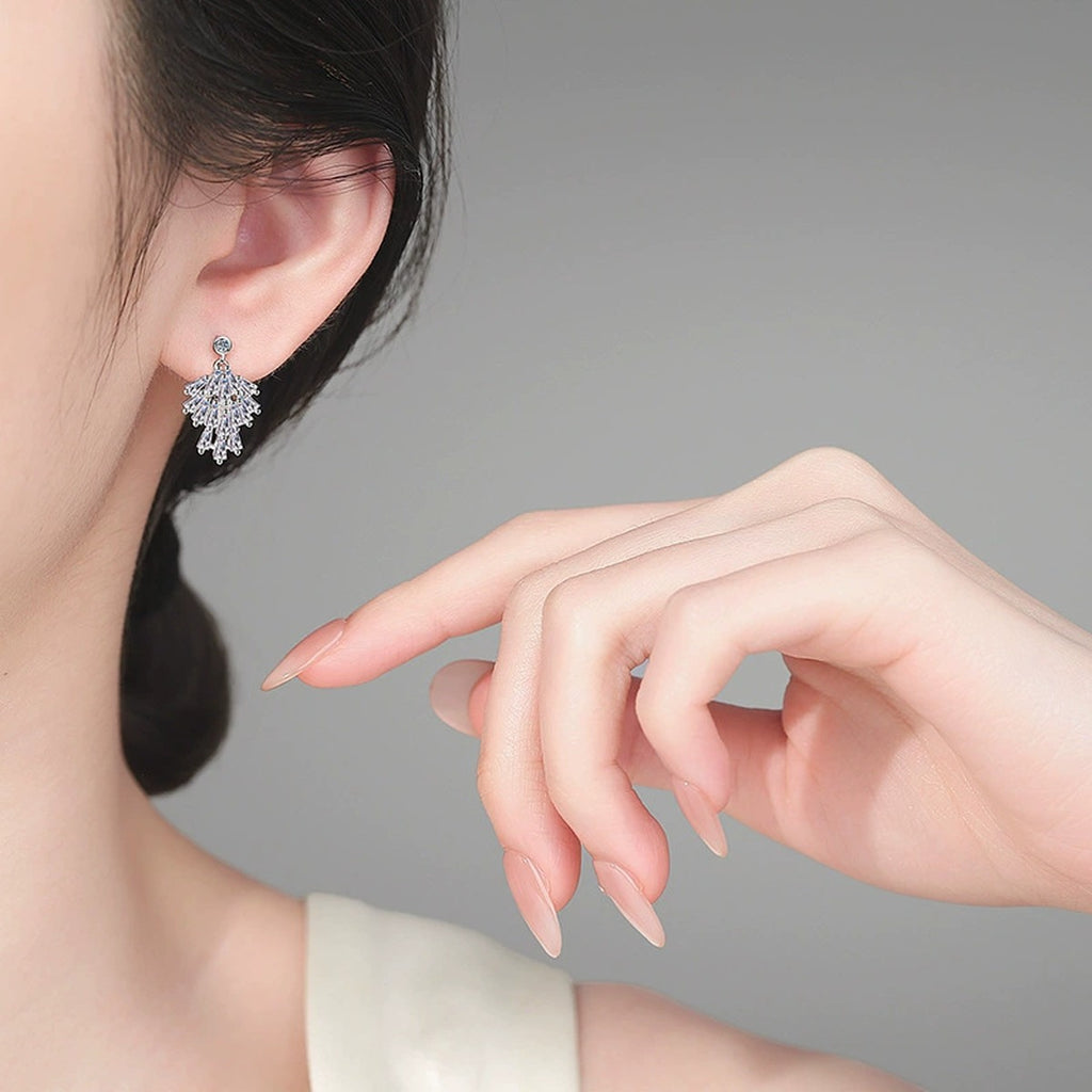 Moissanite Stud Chandelier Earrings in Rhodium-Plated S925 sterling silver worn on ear by model showing scale, placement, and stud earrings styling