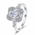 Emerald and Radiant Cut Moissanite Ring with CZ in rhodium-plated S925 sterling silver on clean white background