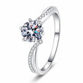 Round Moissanite Ring with CZ in rhodium-plated S925 sterling silver on clean white background