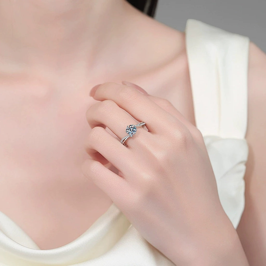 Round Moissanite Ring with CZ worn on hand to show scale, band width, and ring profile
