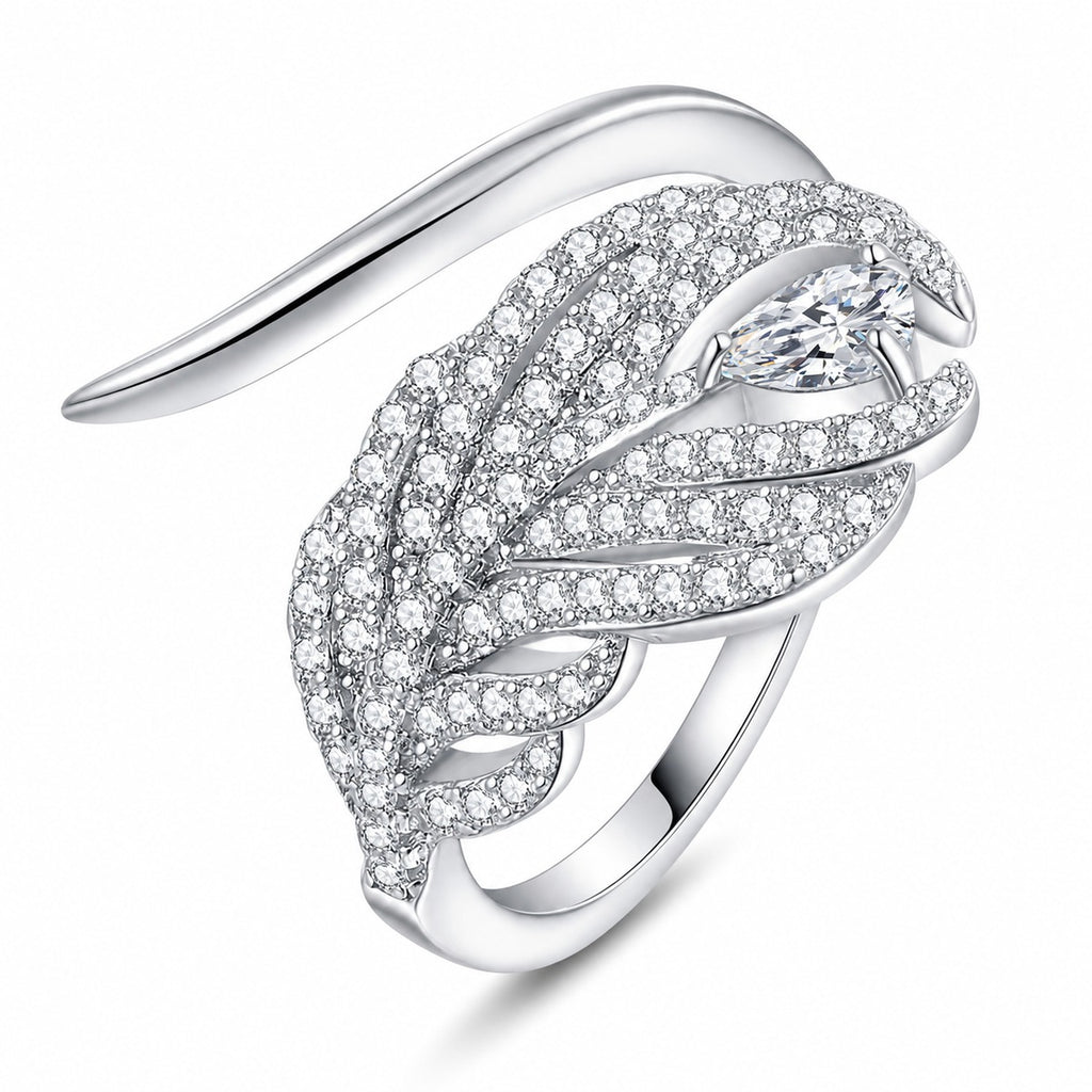 Pear and Round Moissanite Statement Ring in rhodium-plated S925 sterling silver on clean white background
