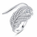 Pear and Round Moissanite Statement Ring in rhodium-plated S925 sterling silver on clean white background