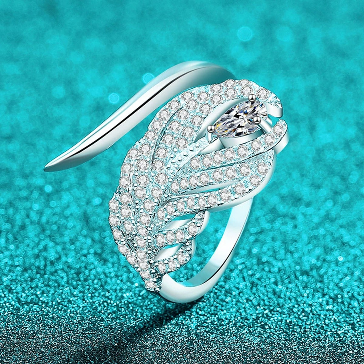 Pear and Round Moissanite Statement Ring product view showing moissanite setting and metal finish
