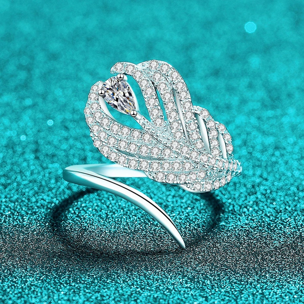 Pear and Round Moissanite Statement Ring product view showing moissanite setting and metal finish