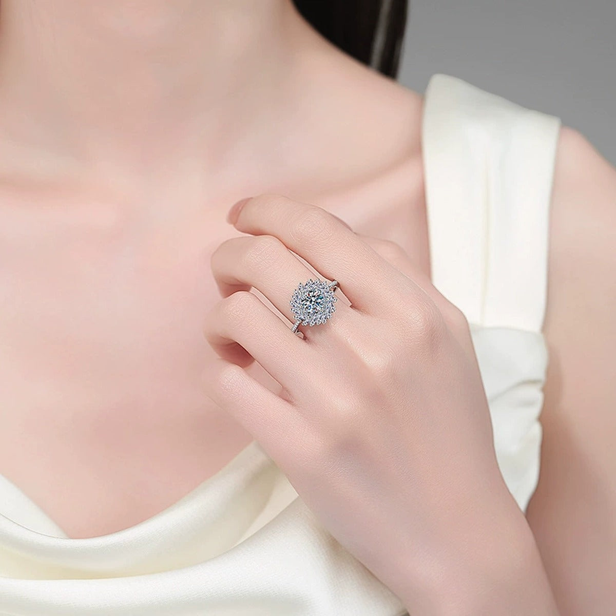 Round Moissanite Halo Ring with CZ worn on hand to show scale, band width, and ring profile