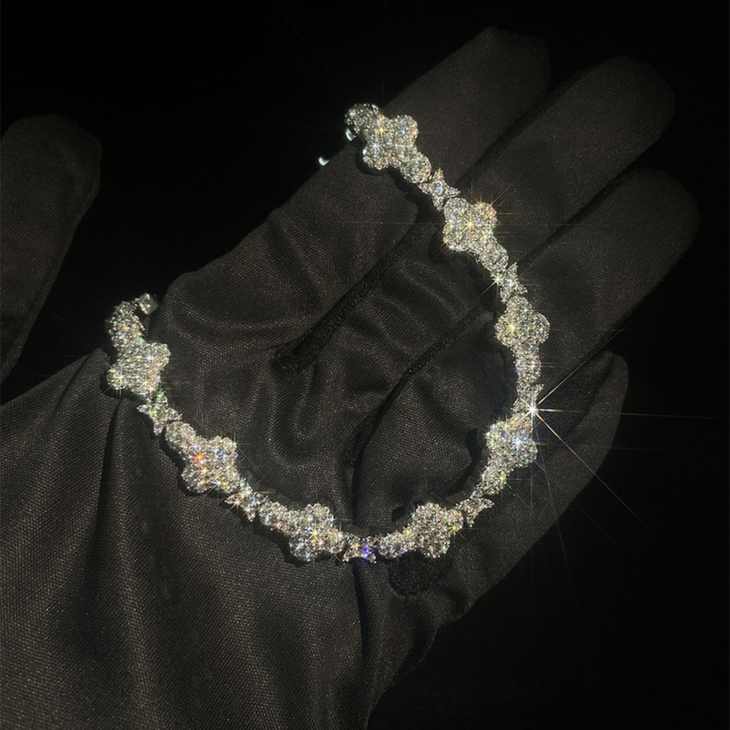 Full Moissanite Tennis Bracelet in Gold-Plated S925 Sterling Silver dark display close-up highlighting stone setting and metal finish