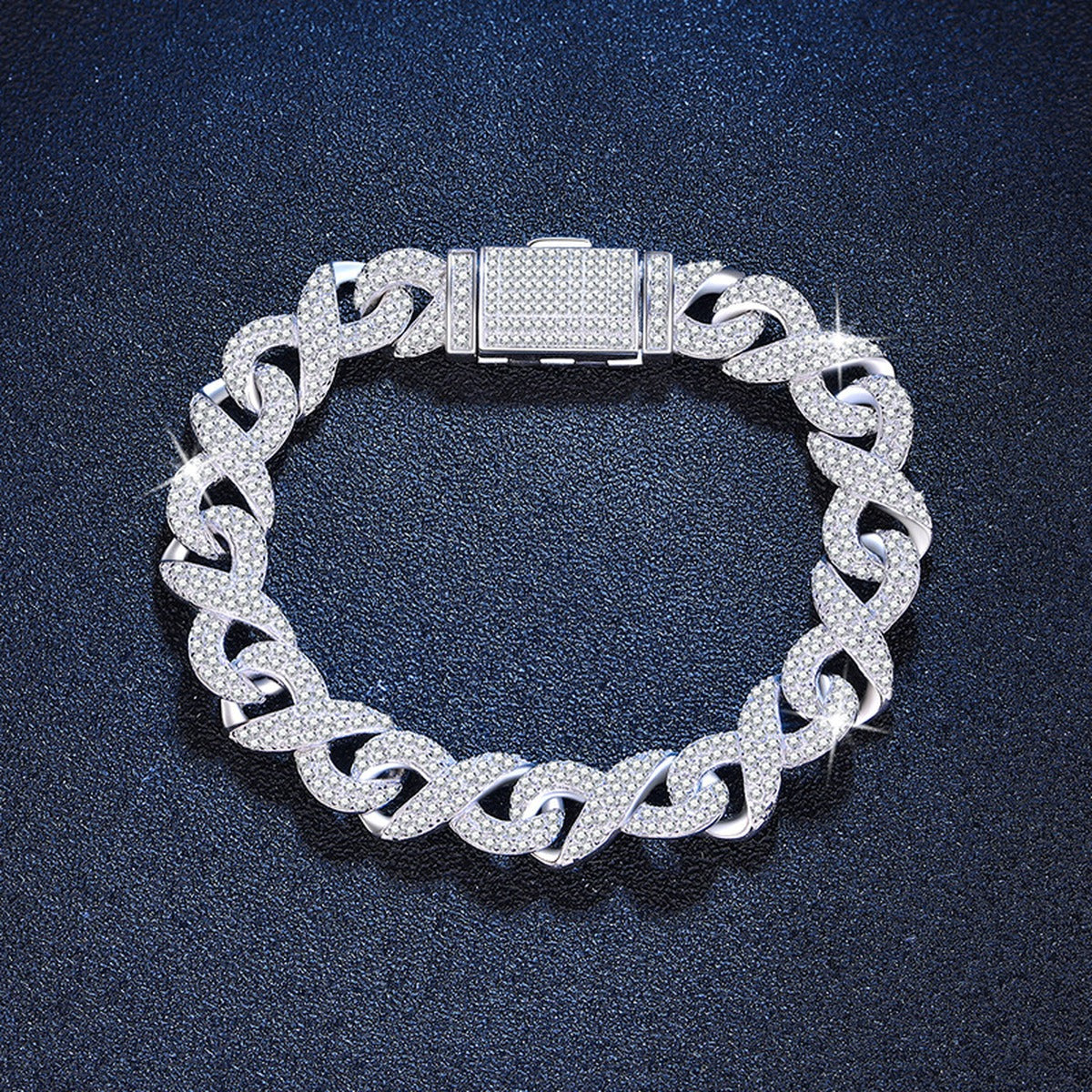 10mm Full Pave Moissanite Cuban Link Bracelet styled on blue display background showing moissanite sparkle and chain detail
