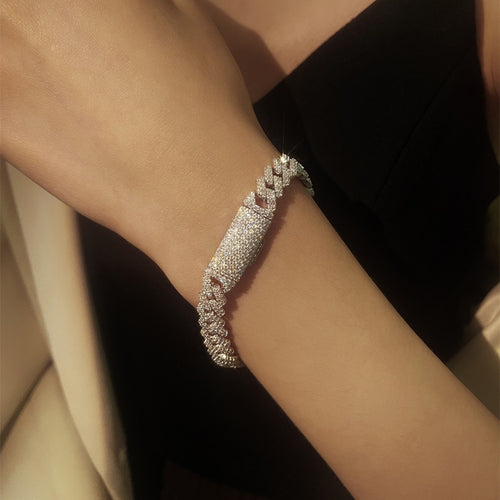 6mm Full Pave Moissanite Cuban Link Bracelet worn on wrist model view showing bracelet scale and fit