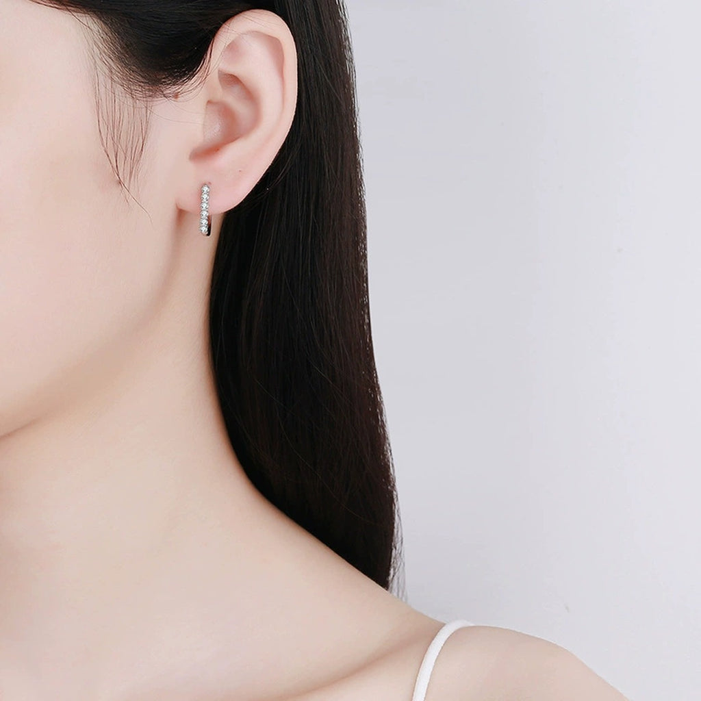 Pavé Moissanite Hoop Earrings with CZ in White Gold-Plated S925 worn on ear by model