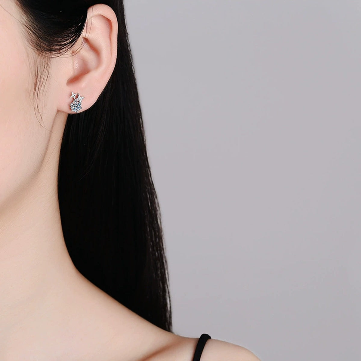 Star Moissanite Stud Earrings with CZ in White Gold-Plated S925 worn on ear by model