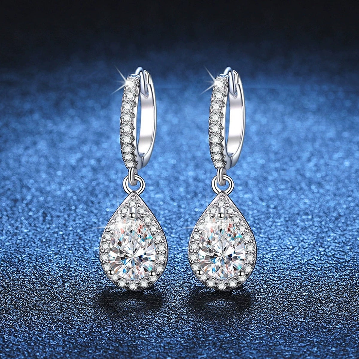 Pear Moissanite Hoop Drop Earrings with CZ in White Gold-Plated S925 blue scene angled view