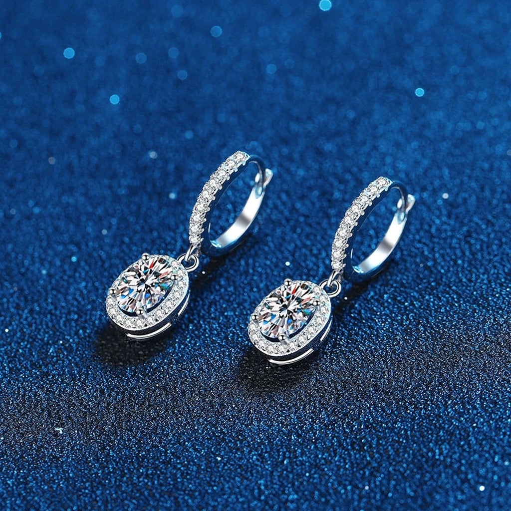 Oval Moissanite Hoop Drop Earrings with CZ in White Gold-Plated S925 blue scene angled view