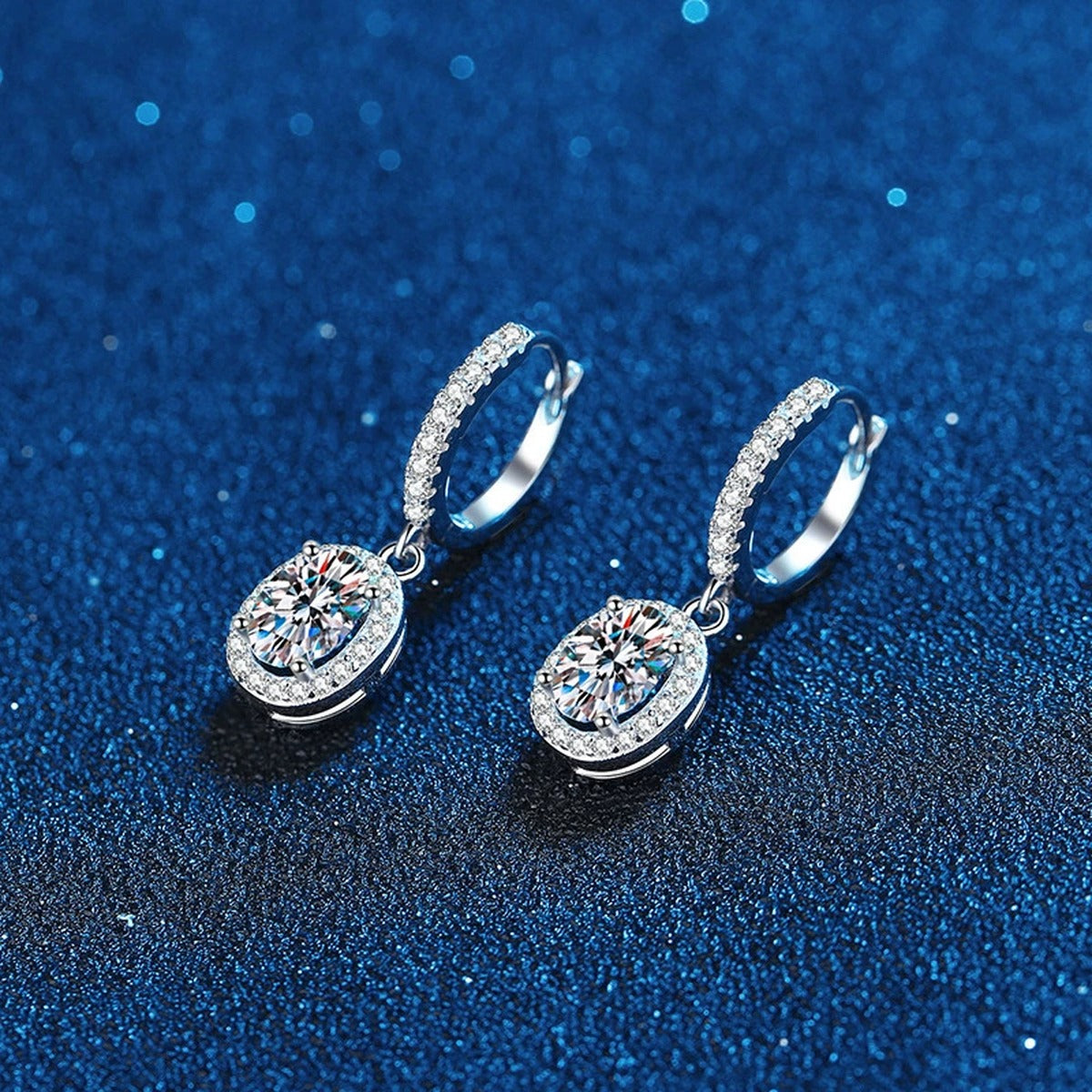 Oval Moissanite Hoop Drop Earrings with CZ in White Gold-Plated S925 blue scene angled view