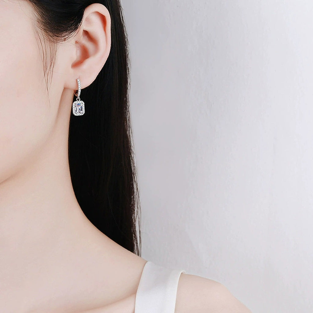 Radiant and Emerald Cut Moissanite Hoop Drop Earrings with CZ in S925 worn on ear by model