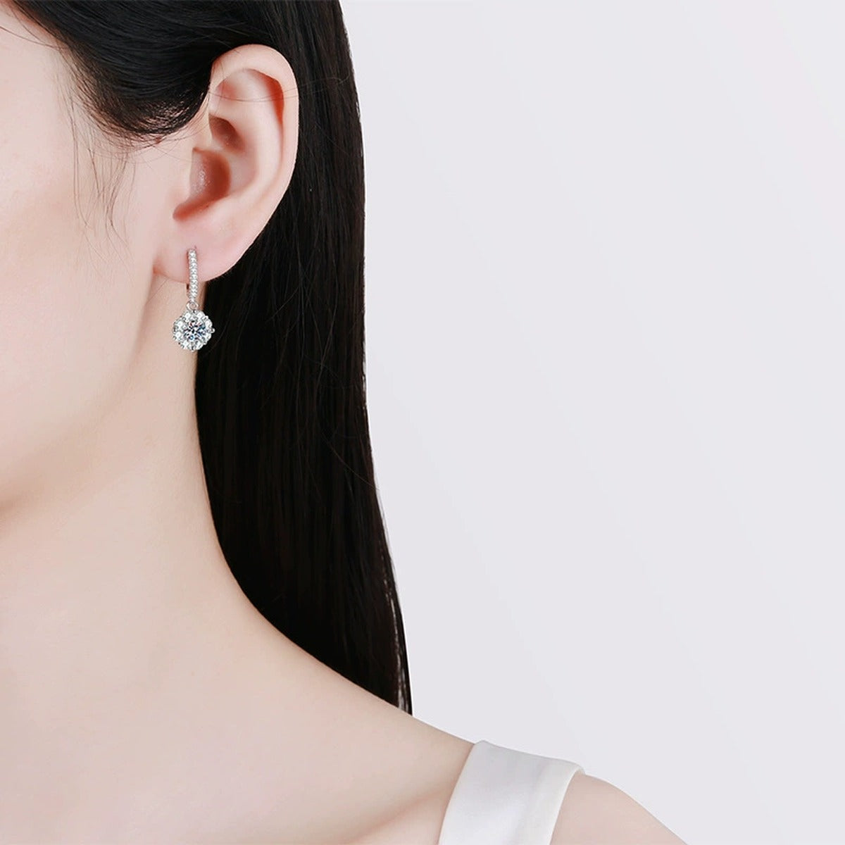 Round Halo Moissanite Hoop Drop Earrings with CZ in White Gold-Plated S925 worn on ear by model