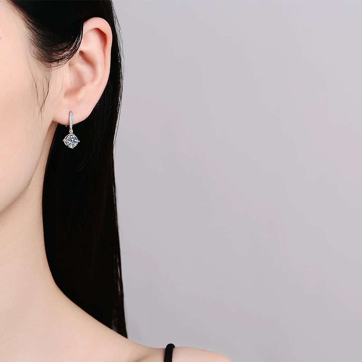 Floral Moissanite Drop Earrings with CZ in White Gold-Plated S925 worn on ear by model