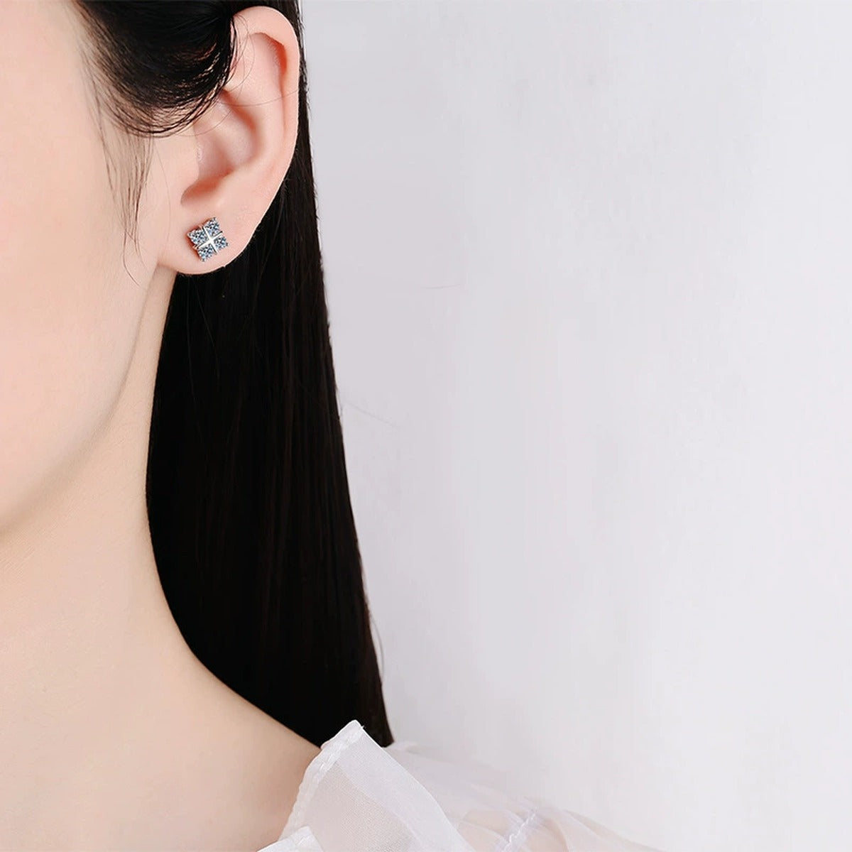 Square Cluster Moissanite Stud Earrings with CZ in White Gold-Plated S925 worn on ear by model