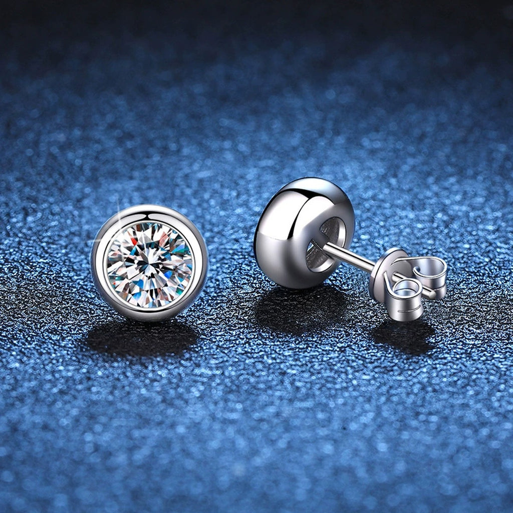 Bezel Moissanite Stud Earrings in White Gold-Plated S925 Sterling Silver blue scene close-up view