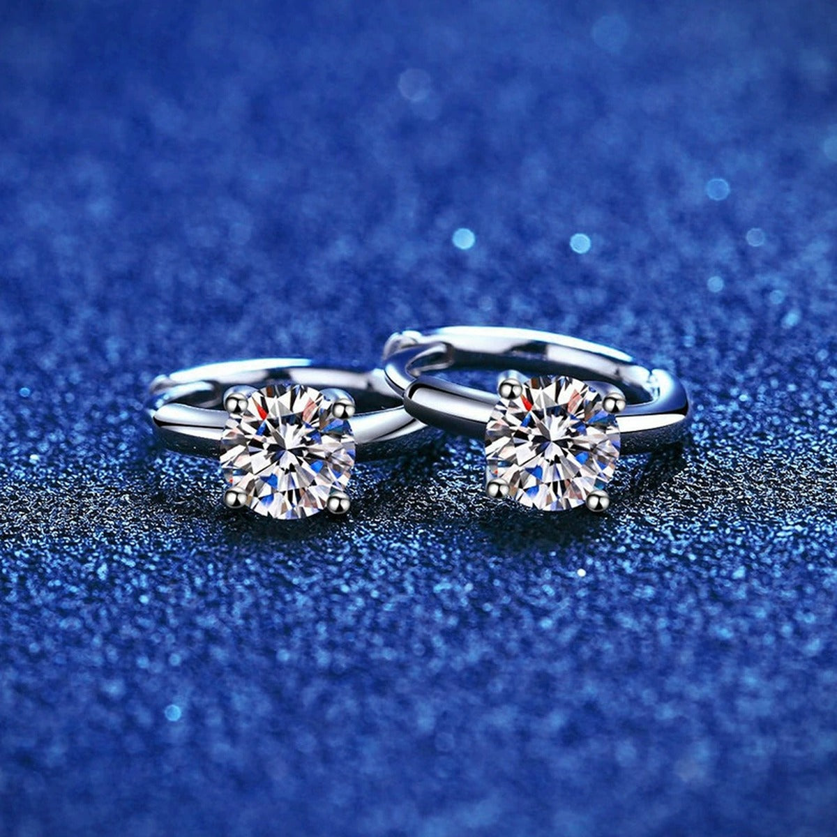 Floral Cluster Moissanite Hoop Earrings in White Gold-Plated S925 Silver blue scene close-up view