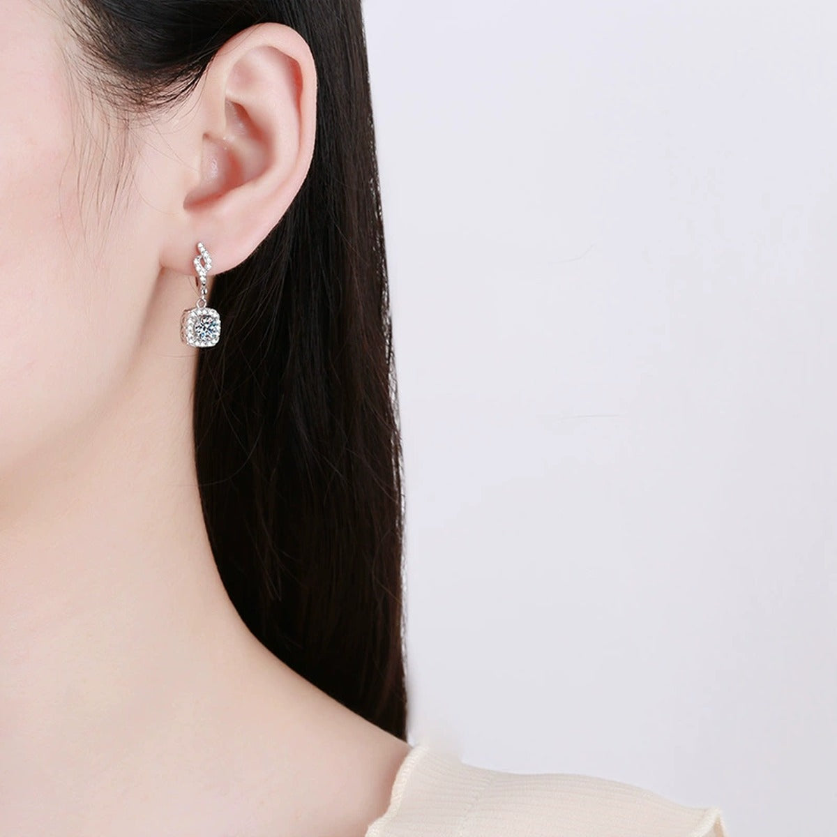 Round Halo Moissanite Drop Earrings with CZ in White Gold-Plated S925 worn on ear by model