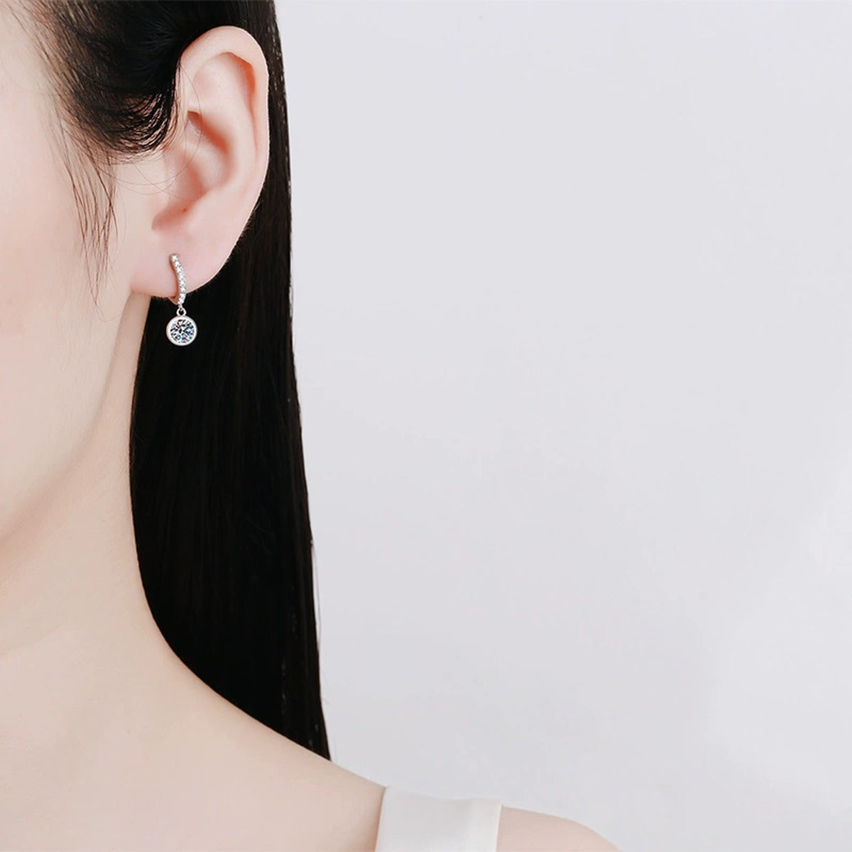 Round Moissanite Hoop Drop Earrings with CZ in White Gold-Plated S925 worn on ear by model