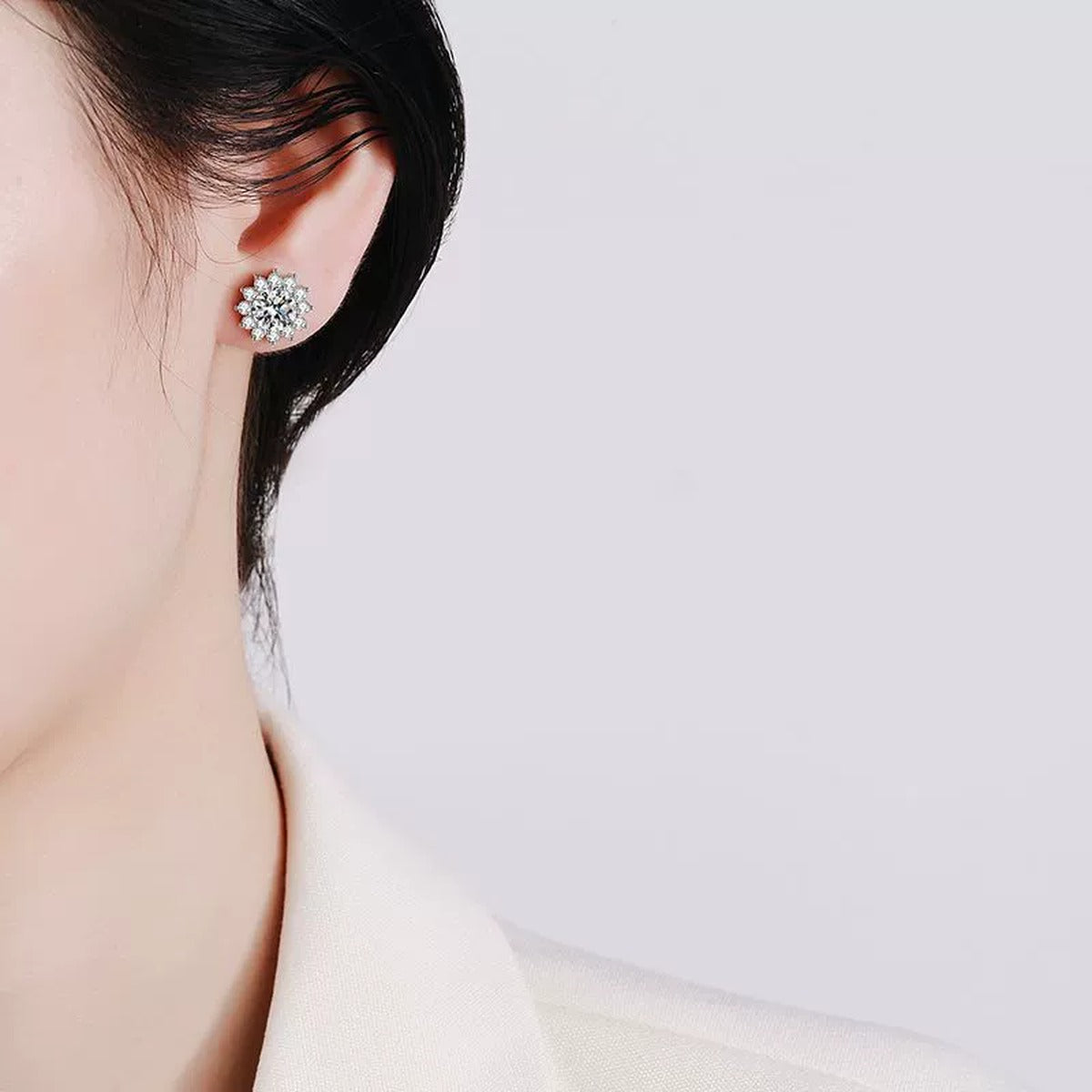 Floral Cluster Moissanite Stud Earrings with CZ in White Gold-Plated S925 worn on ear by model