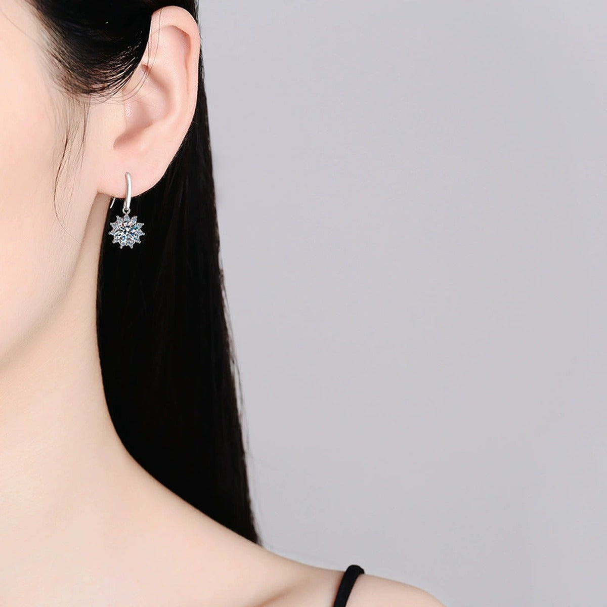 Halo Moissanite Drop Earrings with CZ in White Gold-Plated S925 Silver worn on ear by model