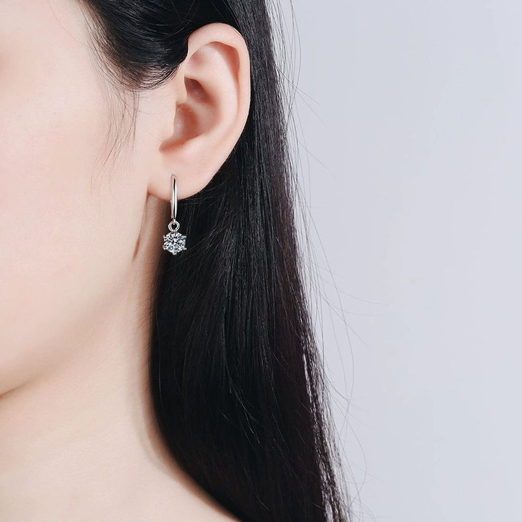 Moissanite Hook Drop Earrings in White Gold-Plated S925 Sterling Silver worn on ear by model