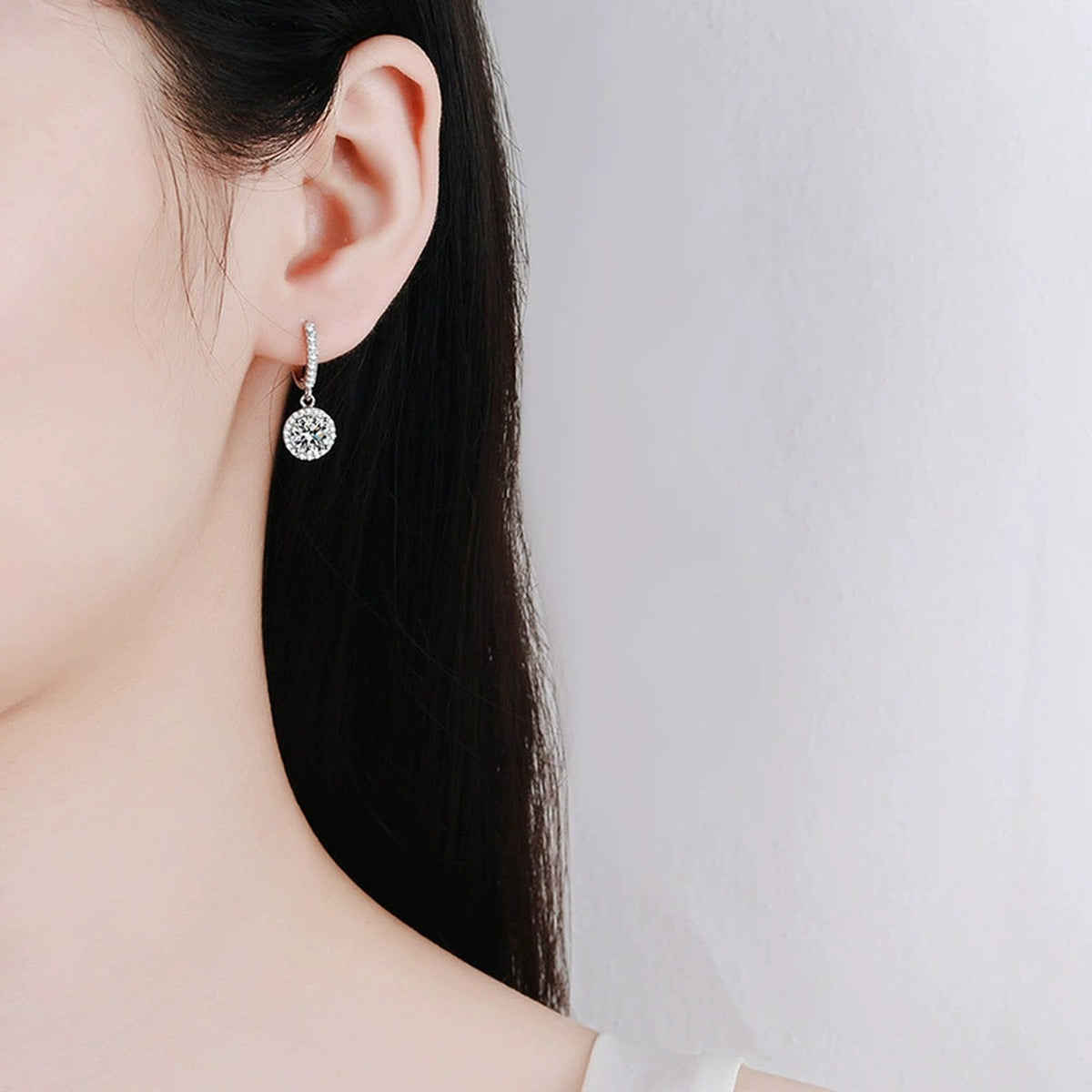 Round Moissanite Hoop Drop Earrings with CZ in White Gold-Plated S925 worn on ear by model